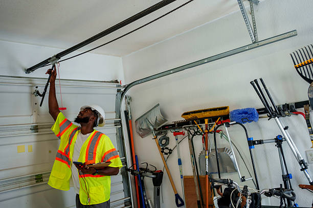 Professional Garage Door Installation technician working in Elwood, UT